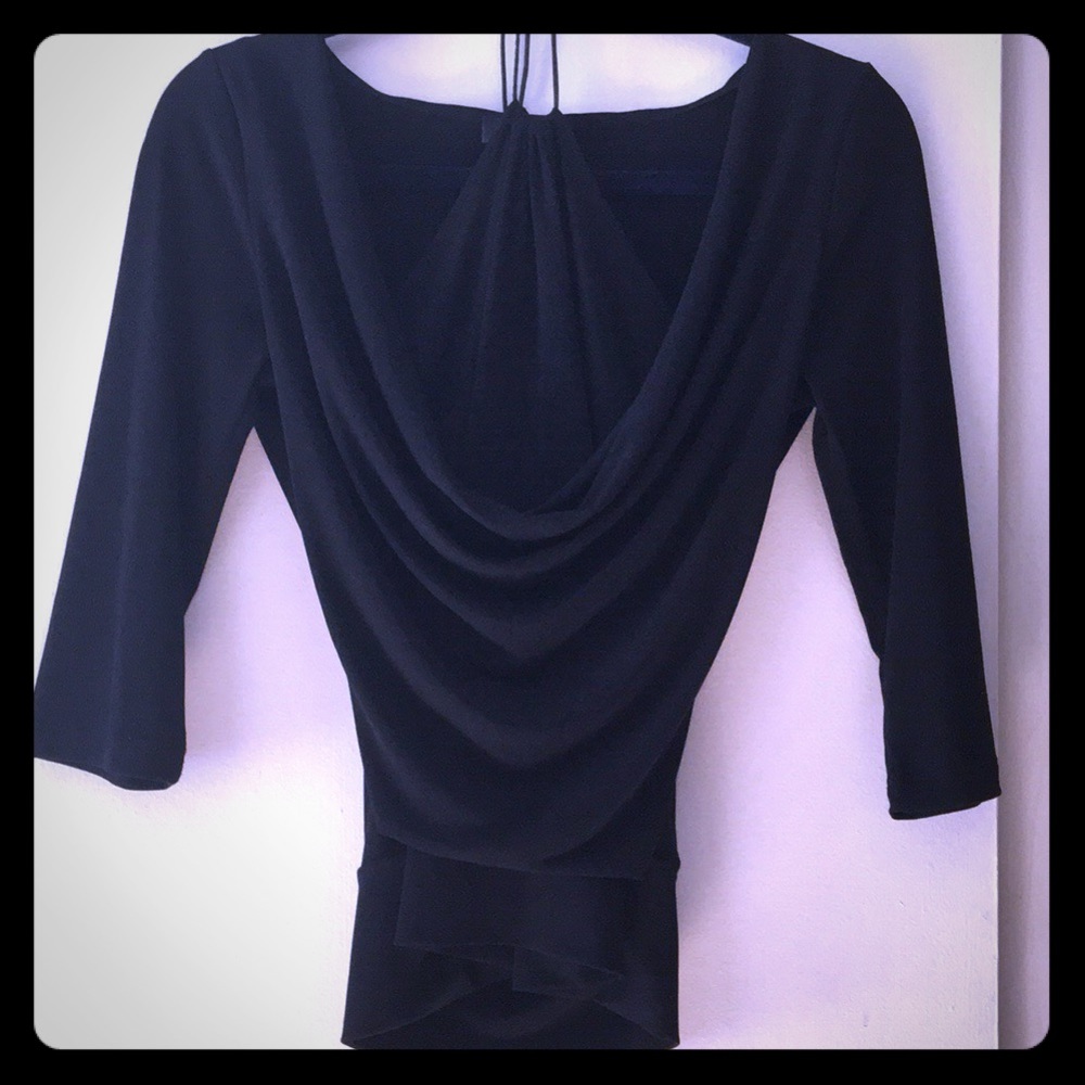 Black top, halter lining and scalloped neckline